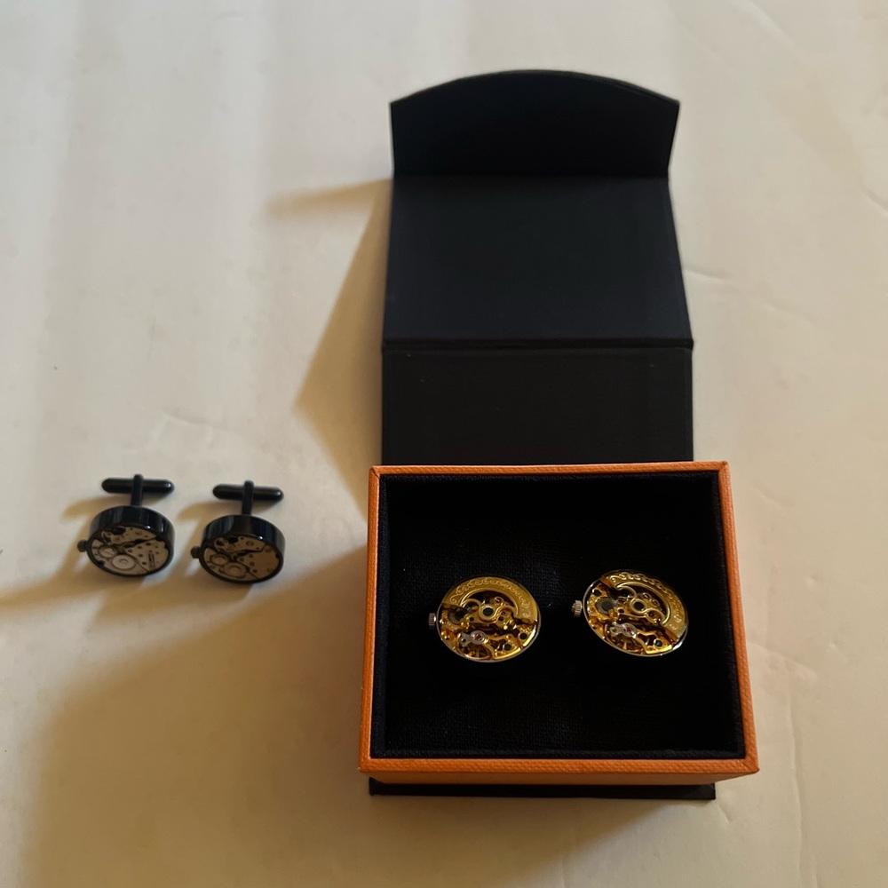 Penny Black Forty kinetic watch movement cufflinks stainless steel. Two pair.